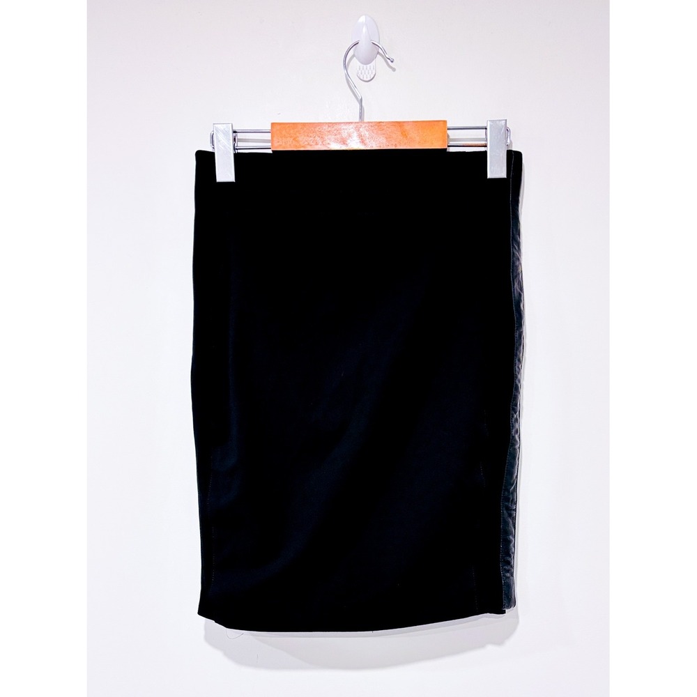 BEBE Black faux leather trim skirt | Sleek fitted edgy‎ | Size 4
